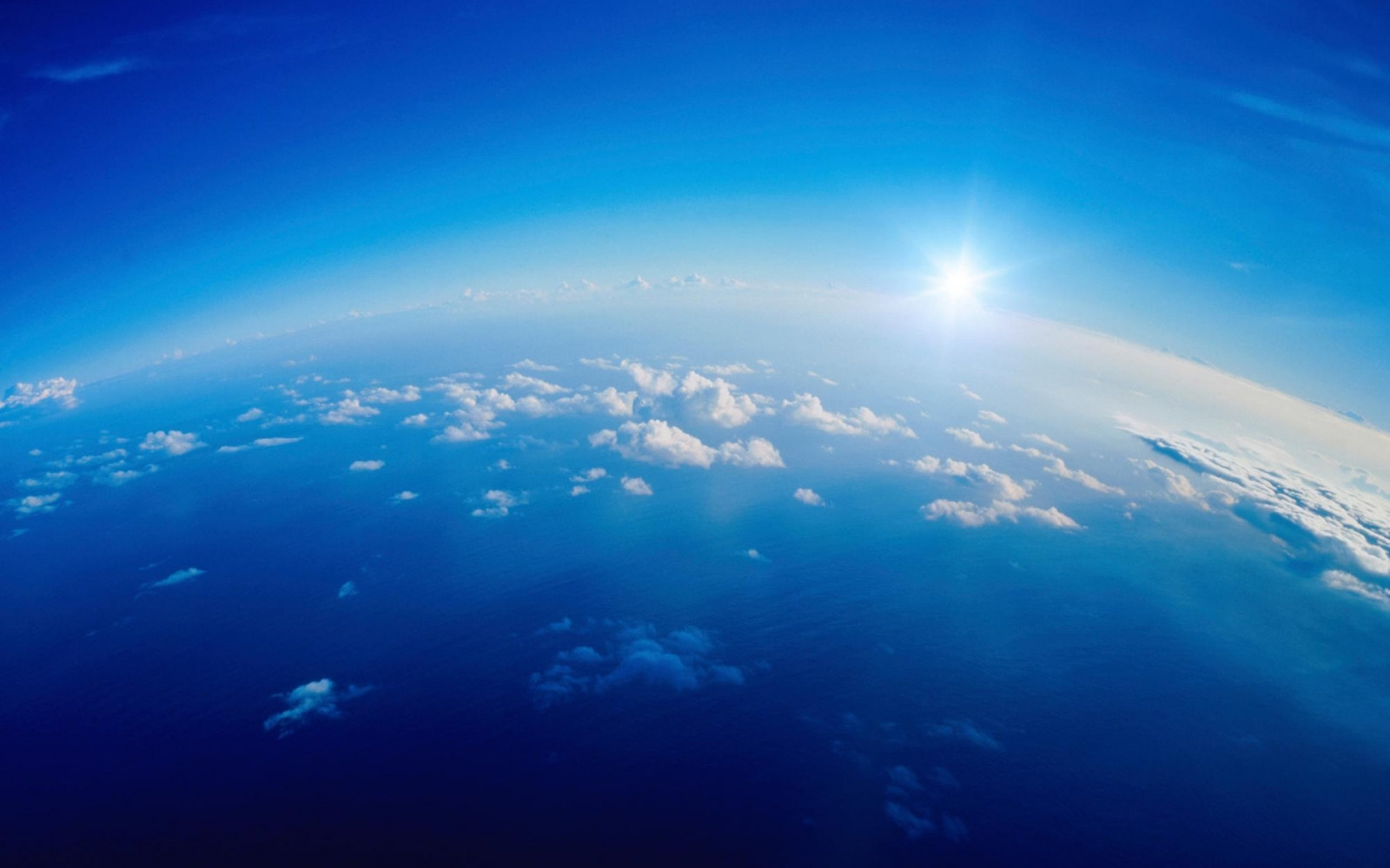 sunlight, white, sea, planet, space, sky, clouds, Earth, calm, blue, Sun, horizon, atmosphere, light, ocean, daytime, computer wallpaper, atmosphere of earth, outer space, air travel, cumulus, phenomenon, height, water resources