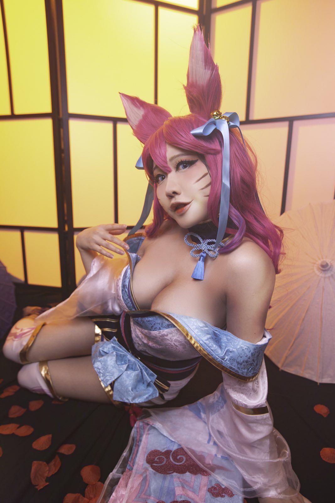 Cosplay model dressed as ahri spirit blossom laying on her side facing the camera All I know is that the spirits led you to me. You're mine now ??? . . . . . #ahrileagueoflegends #spiritblossom #spiritblossomahri #foxears #foxgirl #foxlife #saturdayvibe #saturdaylook