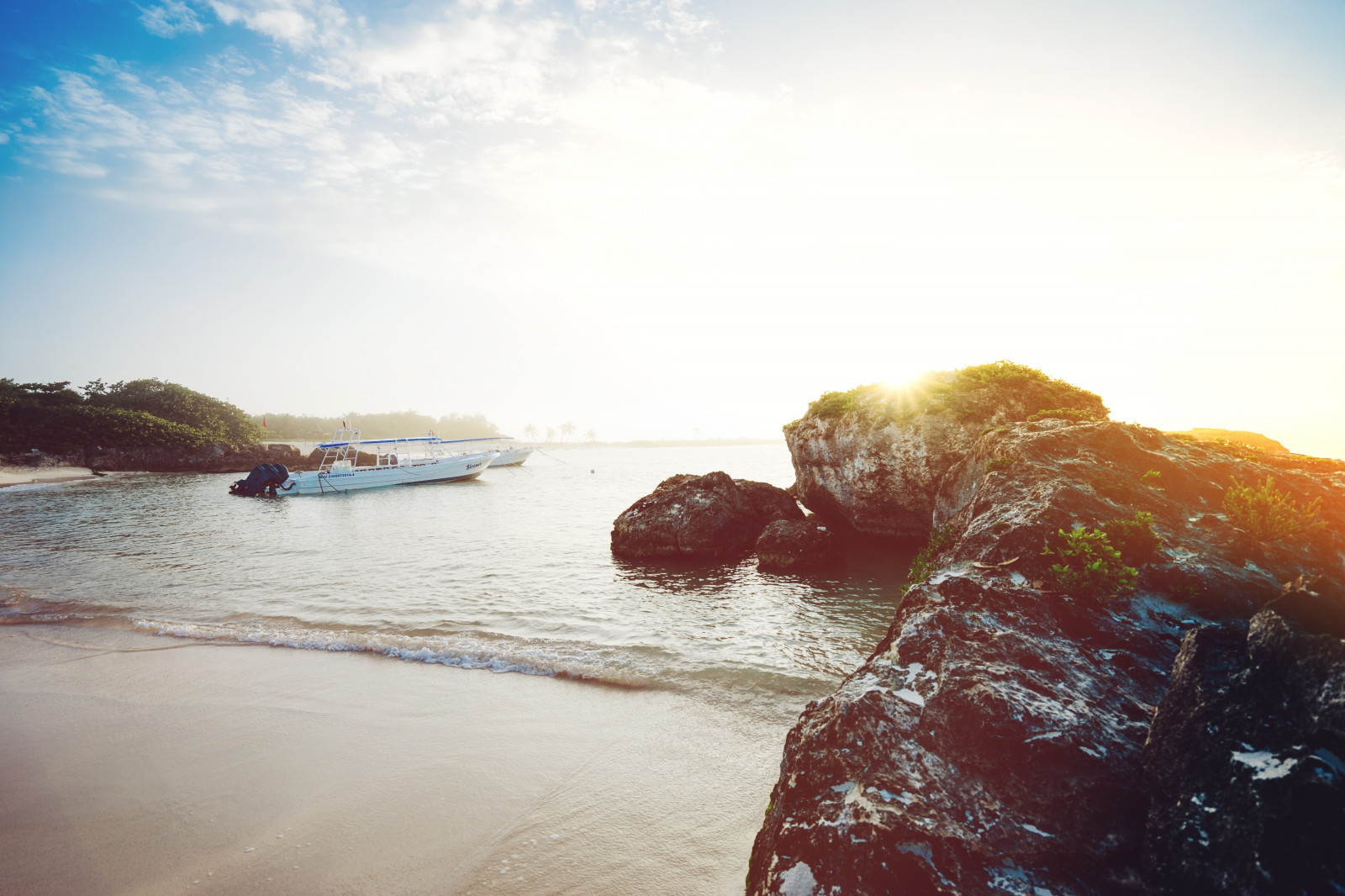 ocean, boats, rocks, shore, sunlight