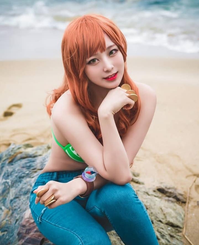 One Piece: Bỏng mắt với bộ ảnh cosplay miêu tặc Nami mặt xinh, dáng chuẩn khiến fans đứng ngồi không yên - Ảnh 7.