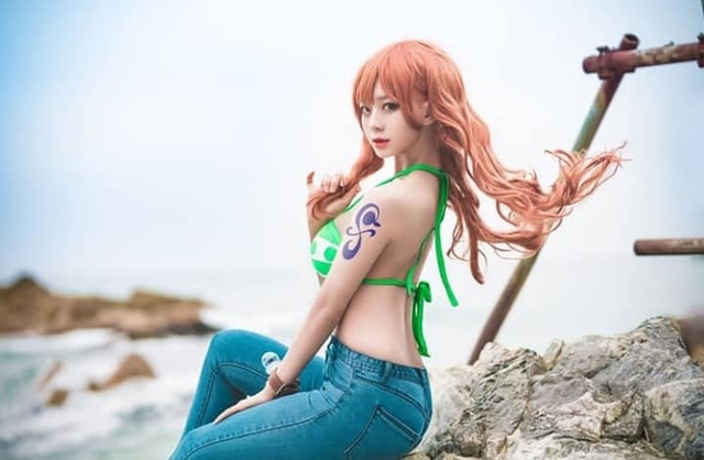 One Piece: Bỏng mắt với bộ ảnh cosplay miêu tặc Nami mặt xinh, dáng chuẩn khiến fans đứng ngồi không yên - Ảnh 8.