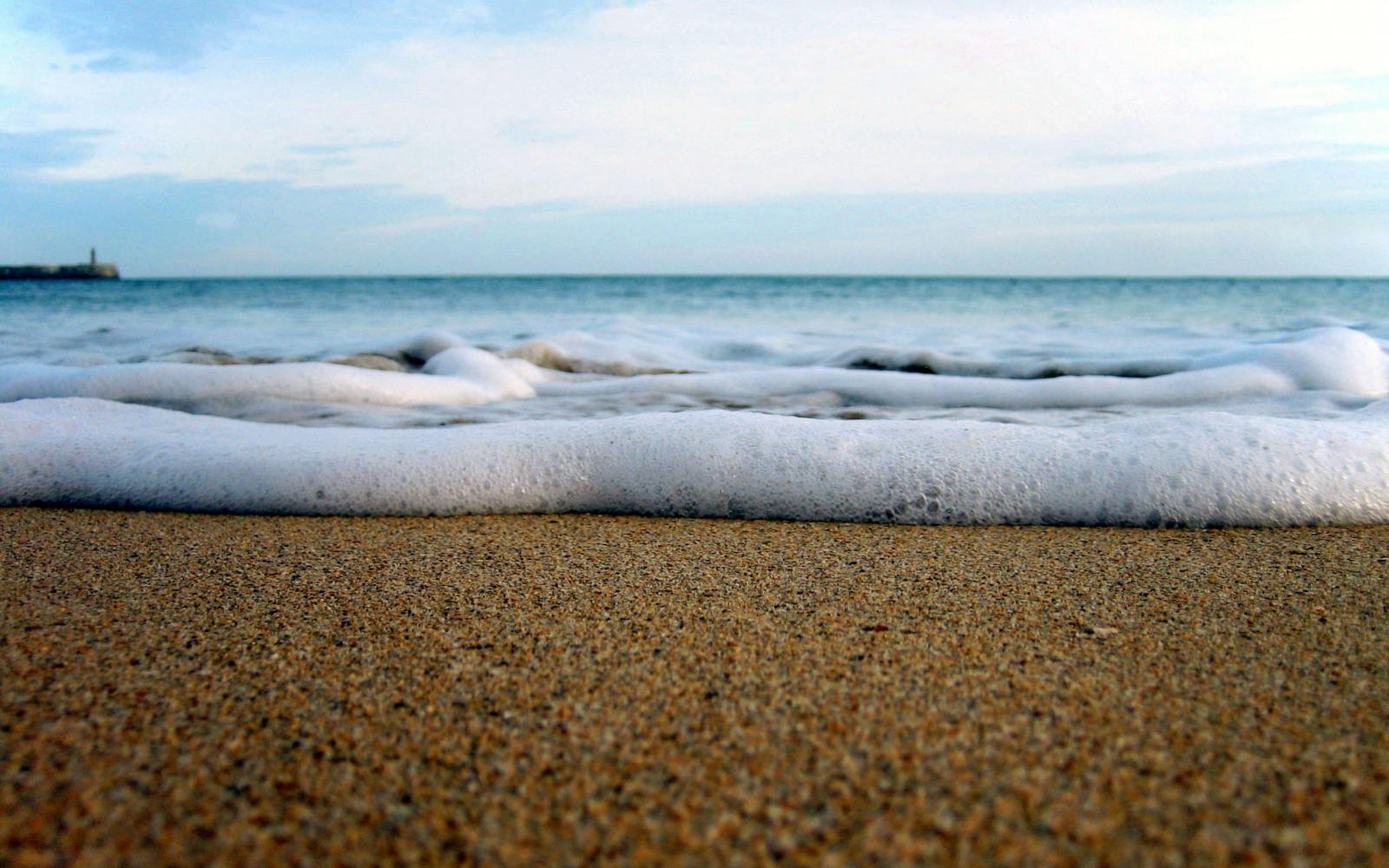 sea, water, shore, sand, sky, beach, calm, coast, horizon, foam, ocean, wave, tide, wind wave, coastal and oceanic landforms