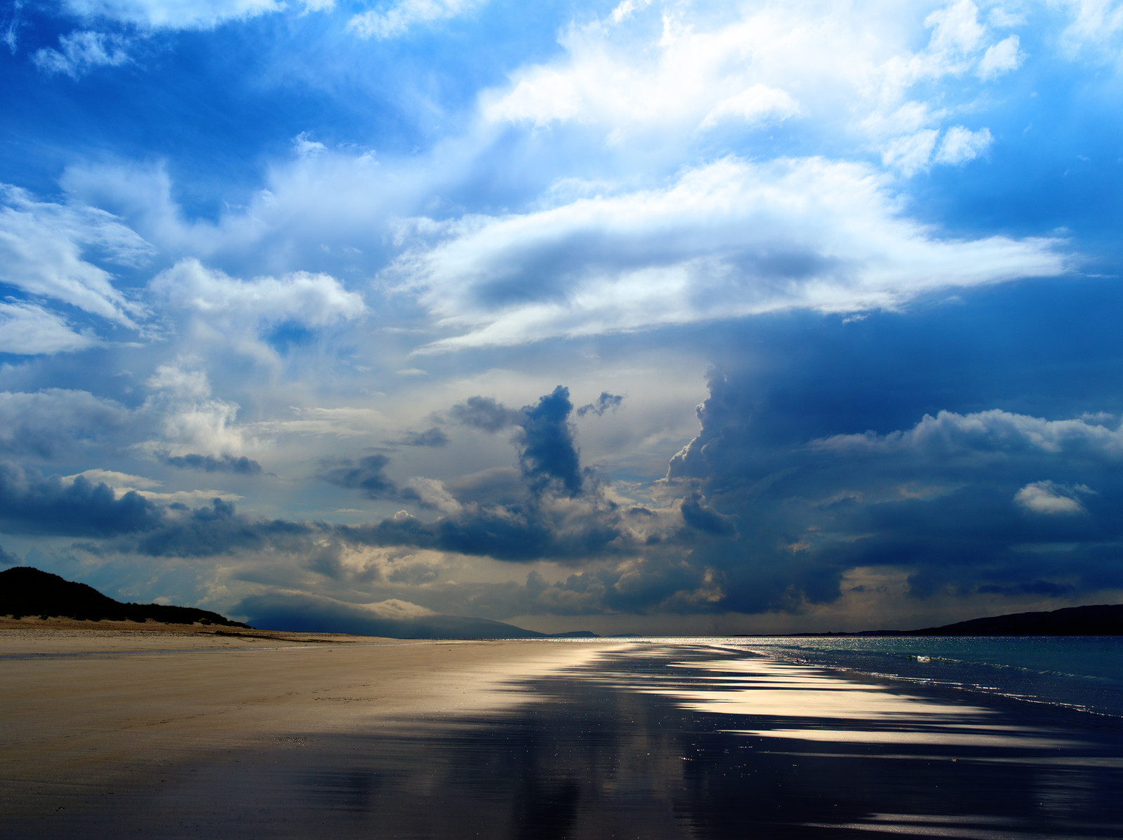 sunlight, sunset, sea, bay, shore, sand, reflection, sky, clouds, beach, sunrise, evening, morning, coast, horizon, dusk, cloud, dawn, ocean, wave, body of water, wind wave, meteorological phenomenon